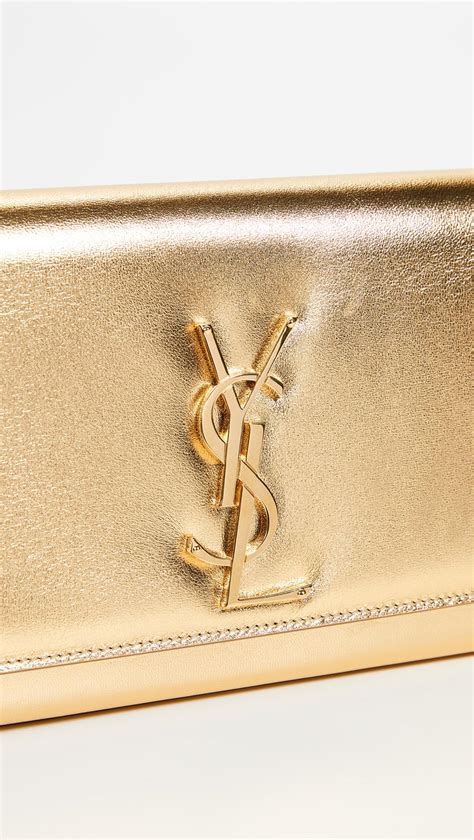 ysl make up clutch|YSL metallic clutch.